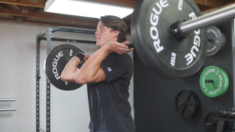 Our tester power cleaning with the Force USA Gunner Barbell.