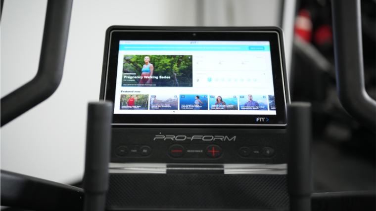 The iFIT fitness app on the 14-inch touchscreen of the ProForm Pro HIIT H14 Elliptical.