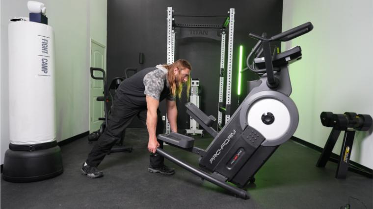 Our tester rolling the ProForm Pro HIIT H14 Elliptical.